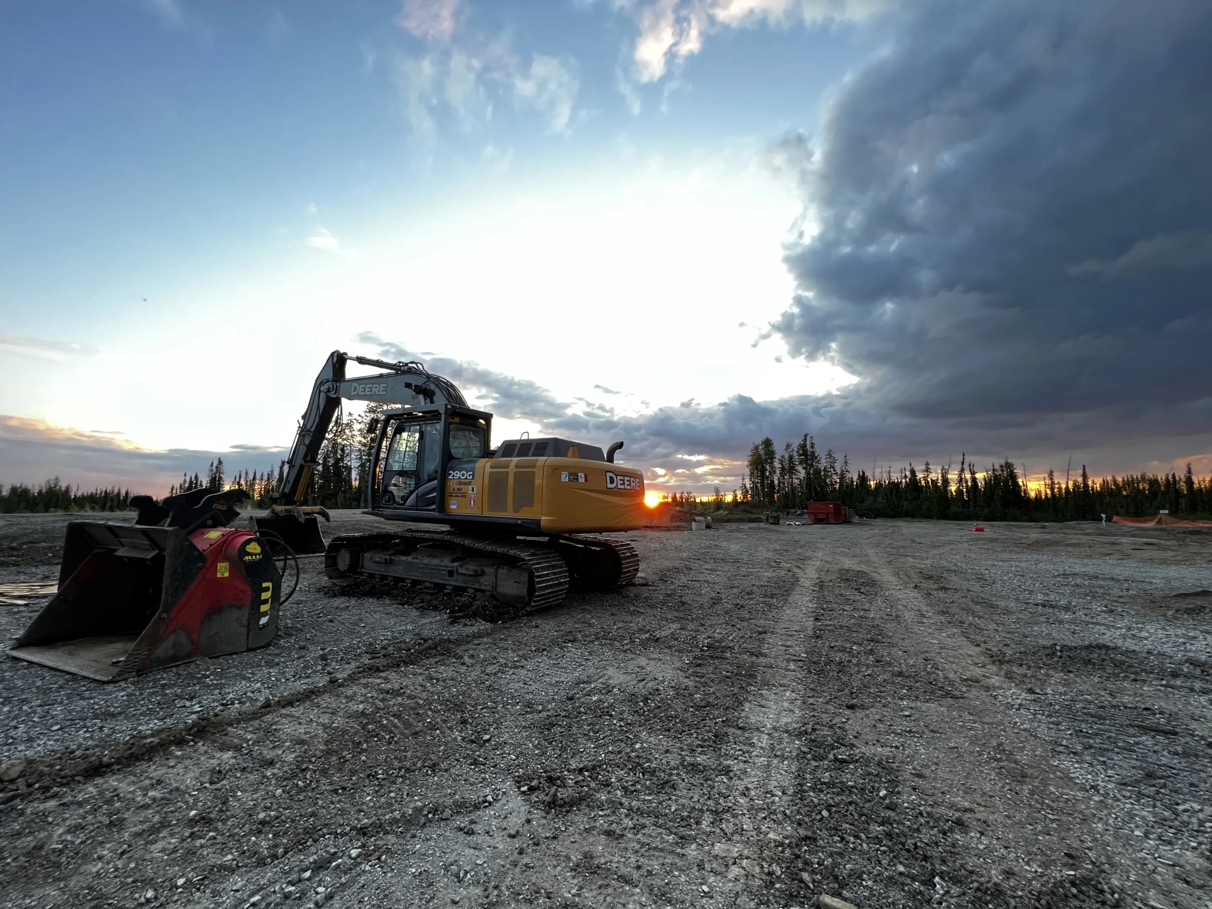 Pipeline release remediation site at on-site treatment area, Deere 290G excavator with hydraulic processor